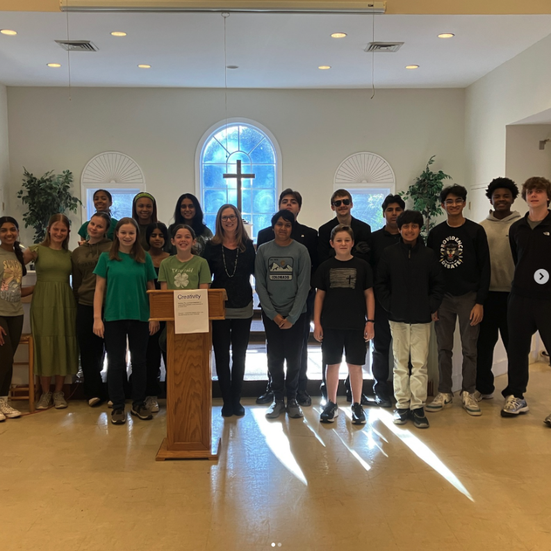Anvitha and fellow Toastmasters officers at a club meeting