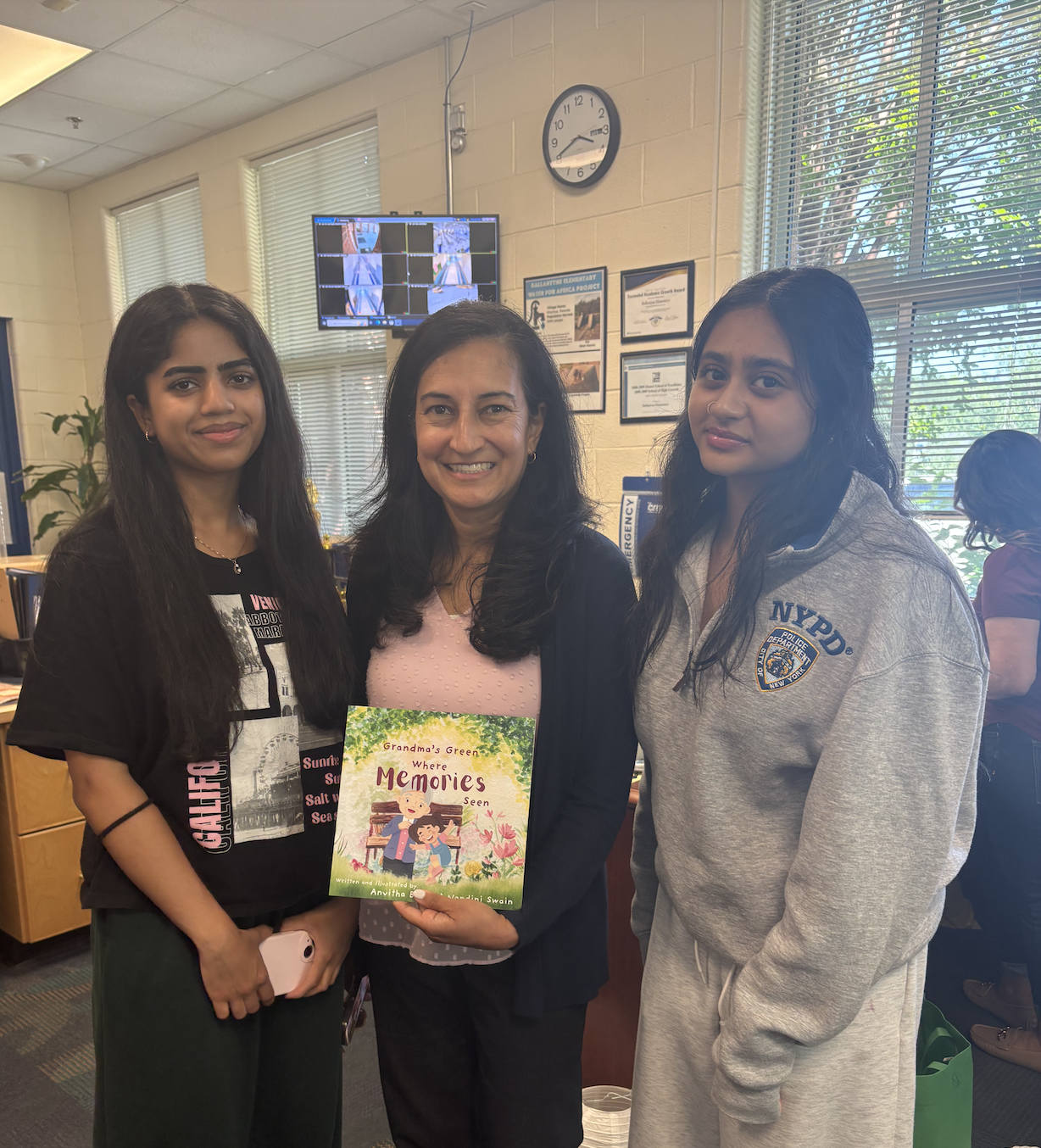 Anvitha reading her books to a classroom