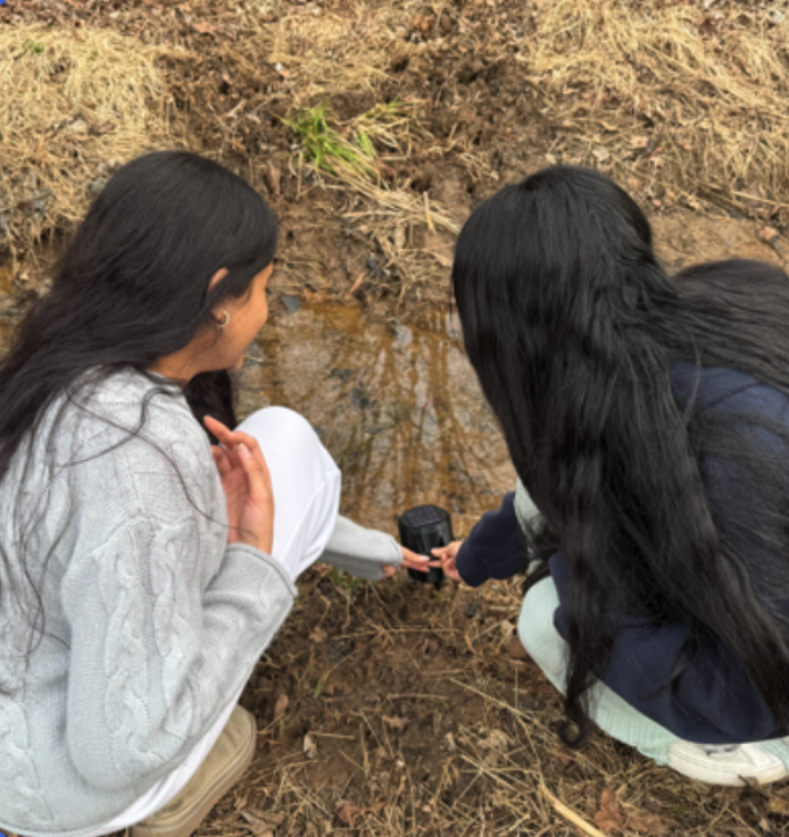 Anvitha and a teammate testing the LarvaLyte prototype