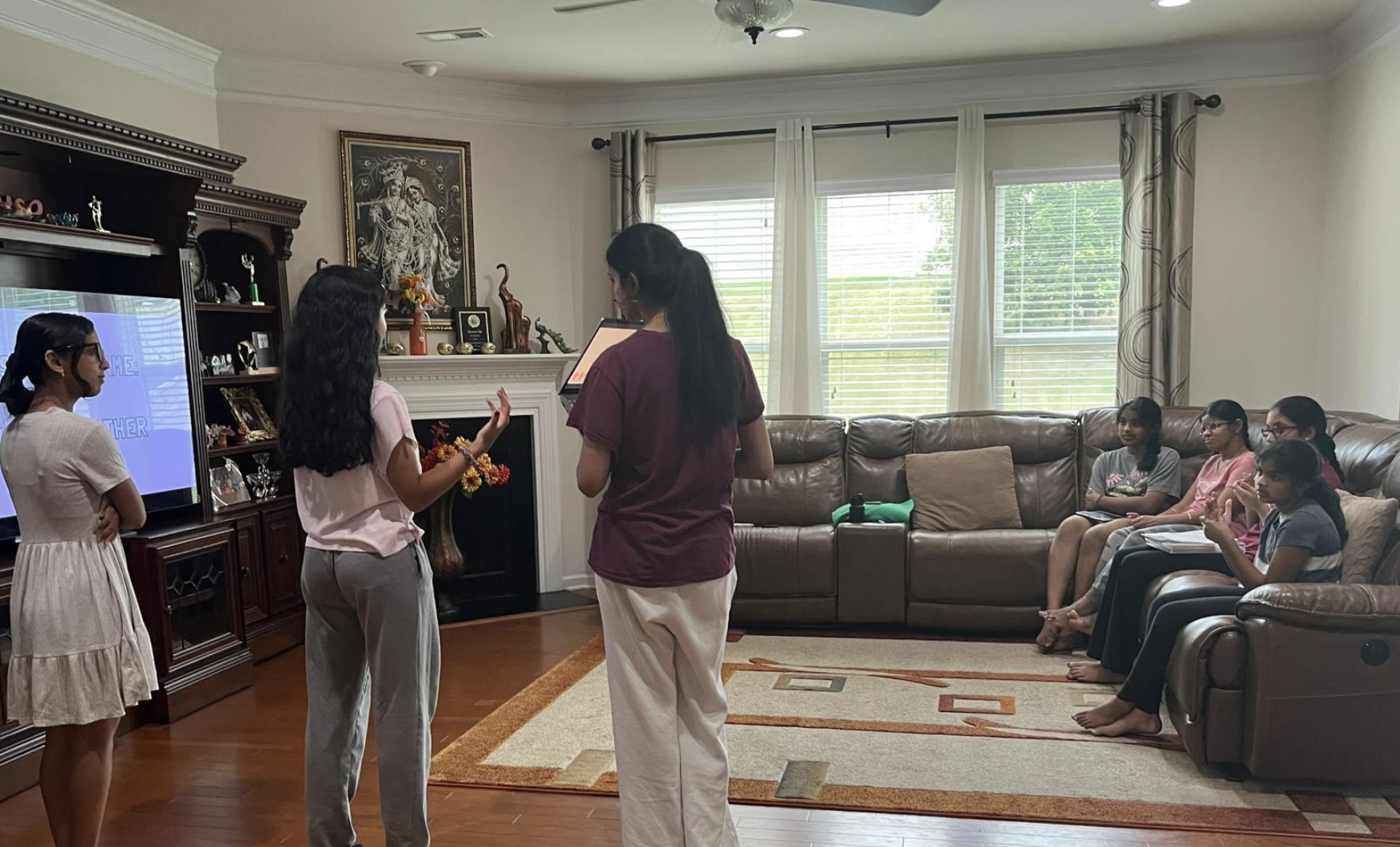 Anvitha teaching public speaking to elementary students
